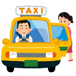 タクシーに乗る女性